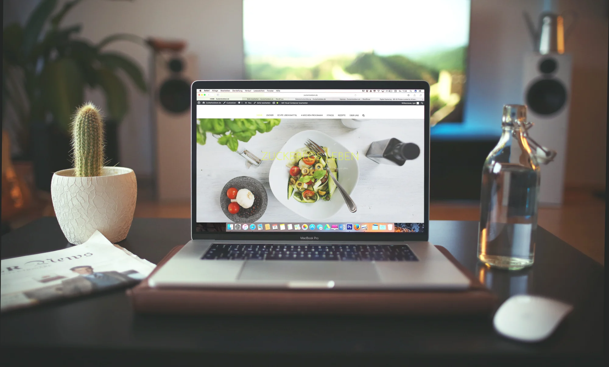 Laptop on a desk displaying a restaurant website